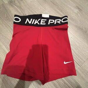 red nike pros